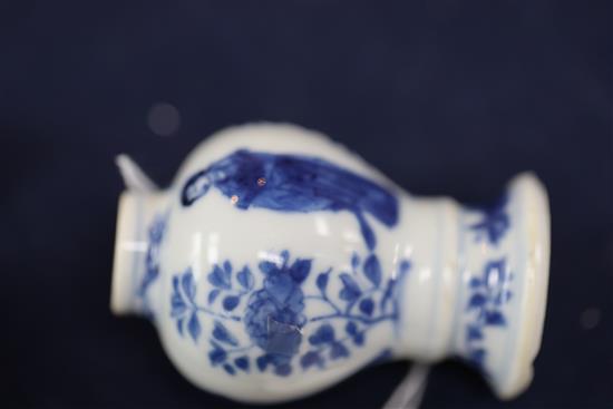A Chinese blue and white small jar and cover, and a similar small vase, Kangxi period, H. 6.7 and 7.7cm
